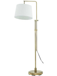 Crown Point Downbridge Adjustable Floor Lamp in Antique Brass.
